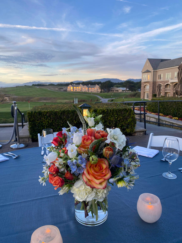 Orange,white  and blue centerpiece